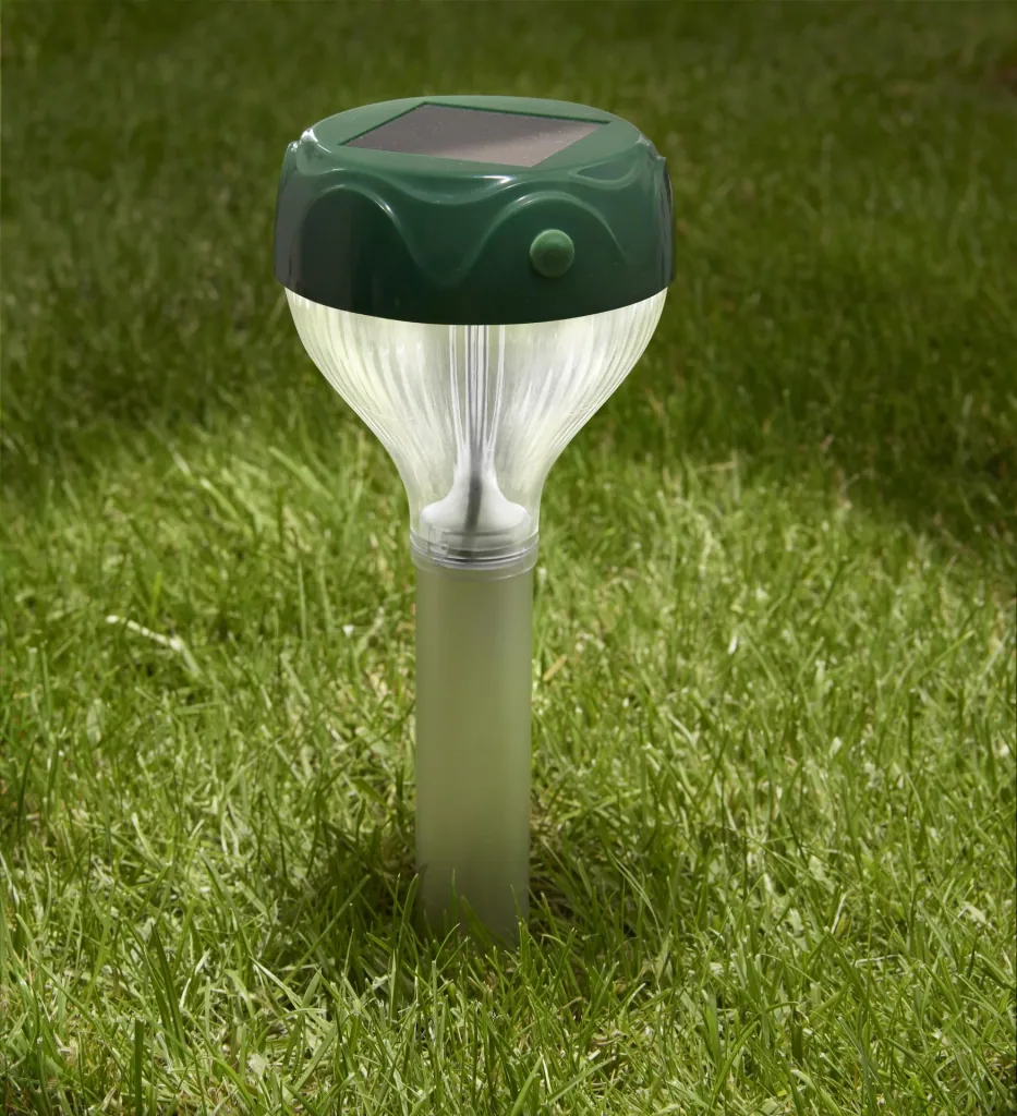Solar-powered burrowing animal repeller including lighting 2-in-1